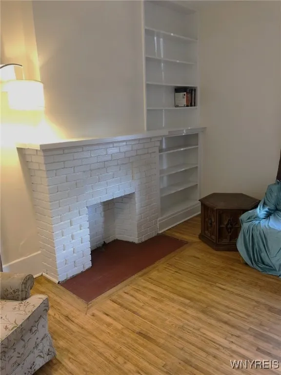 Fireplace and built-in bookshelf