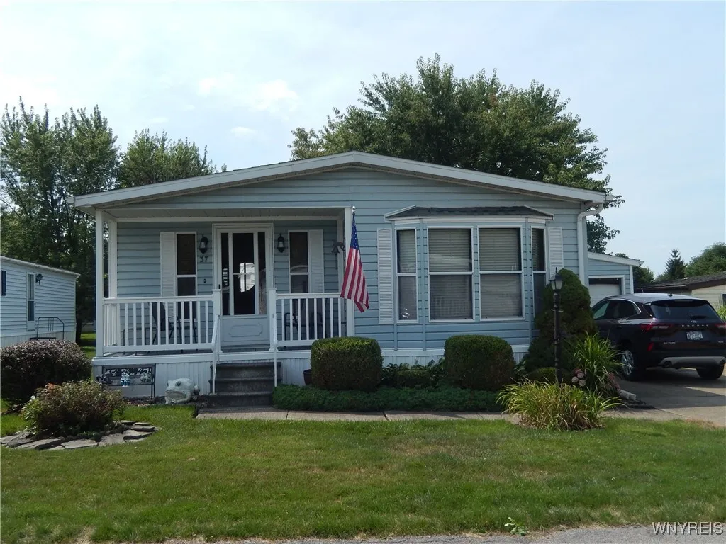 Cozy front porch with Double Wide Driveway