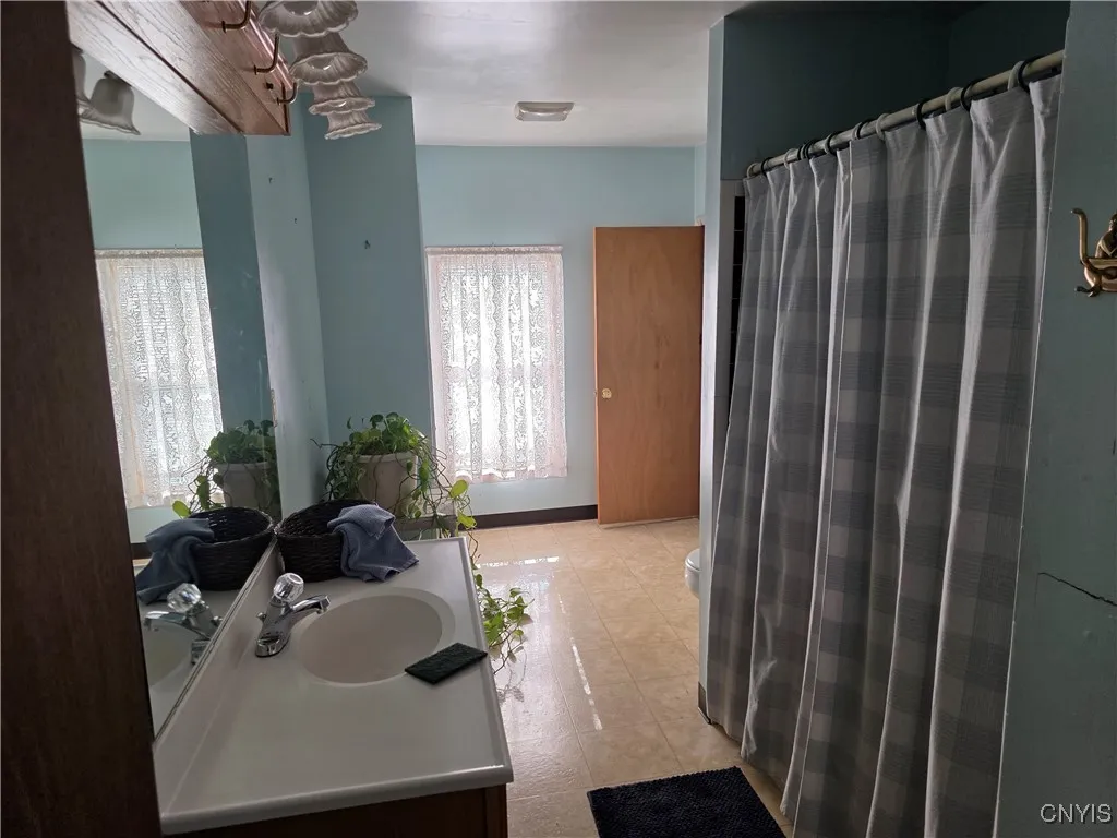 Large bathroom from hallway door