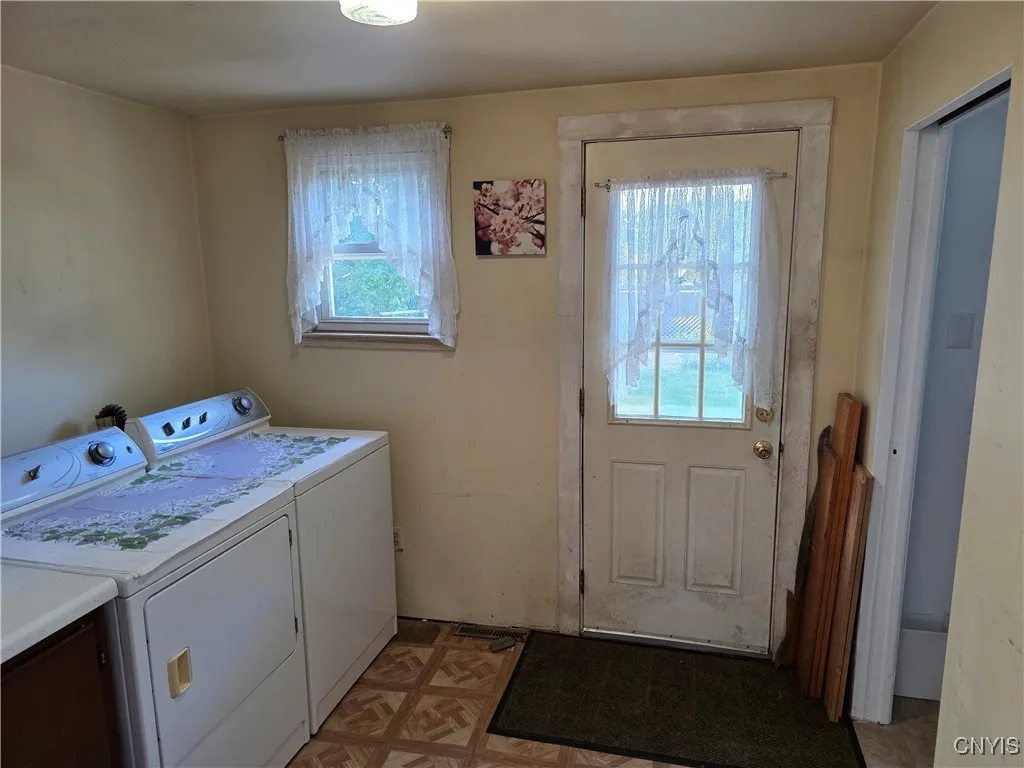 1st floor laundry with door to deck and rear yard
