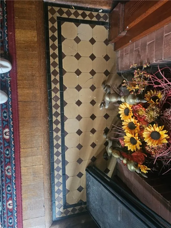 Tiled hearth in dining room.