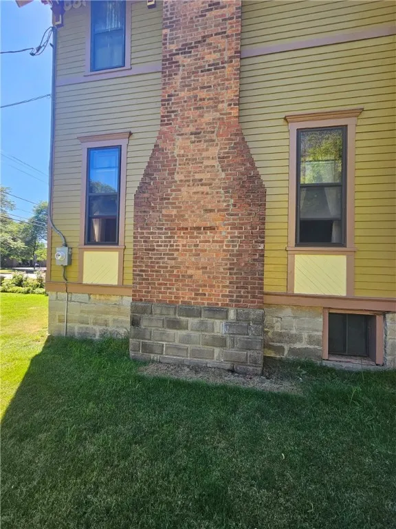 Stone foundation, brick fireplaces