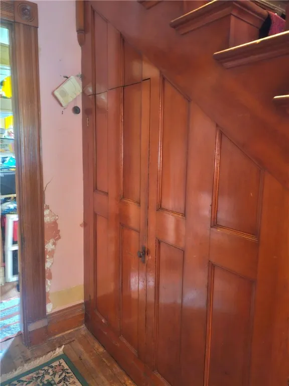 Paneled wall into powder room