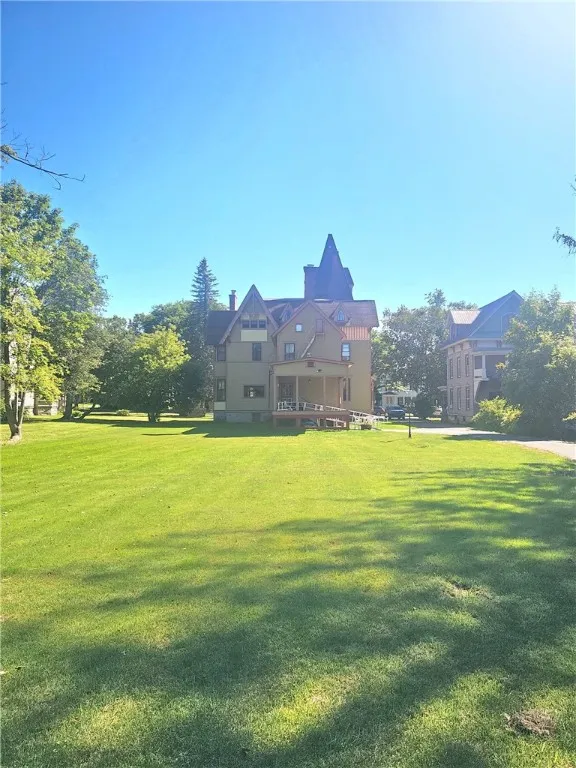 Large, manicured lawn out back