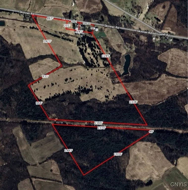 2 homes, a dairy barn, pole barn, and 131 acres included.