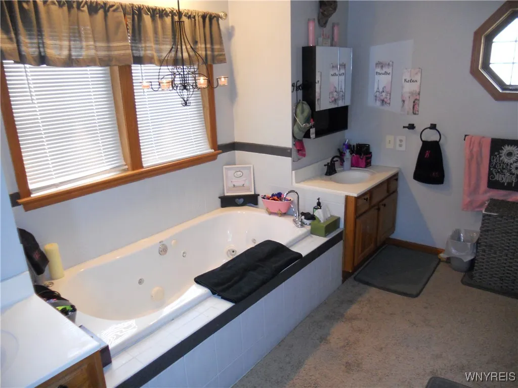 Split double vanities and jacuzzi tub