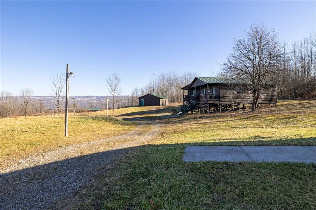 View of one of the bunk houses and bath house.