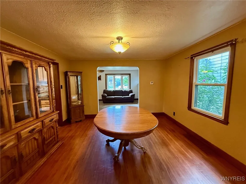
Formal dining room features gorgeous hardwood floors, with additional hardwood hidden beneath carpet in some other areas of the home.
