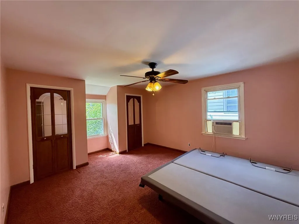 Second floor primary bedroom with two closets