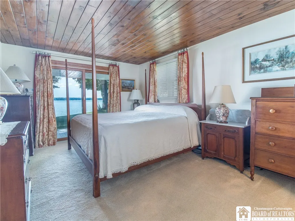 First floor bed suite with sliders to the deck