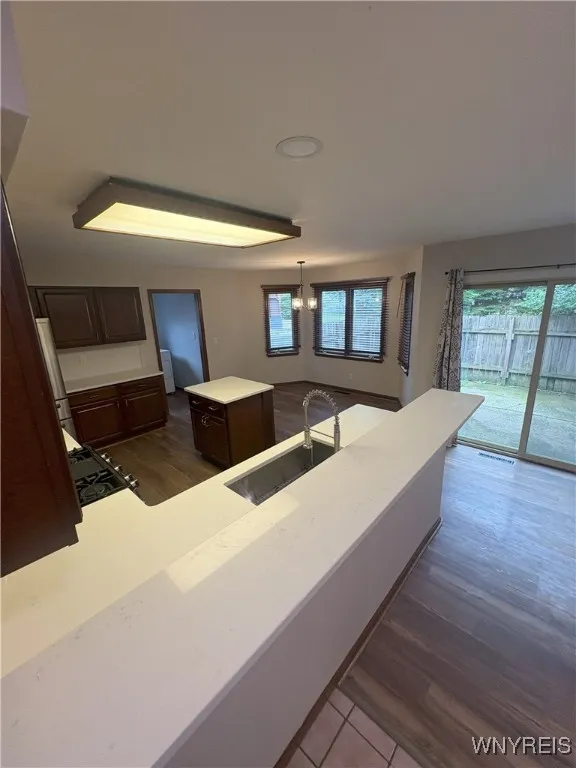 Kitchen, with pantry and first floor laundry off to the side. Nice eat in area as well.