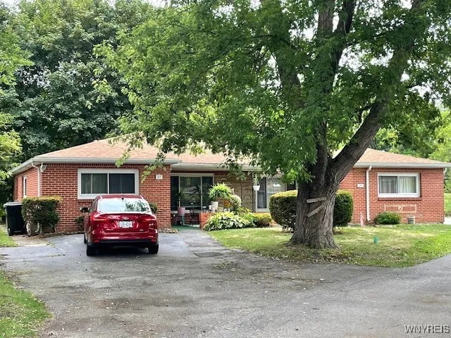 A rare find.....side by side  brick ranch duplex with private back yard ( no neighbors).