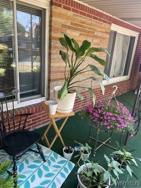 Covered patio in the front of the house.