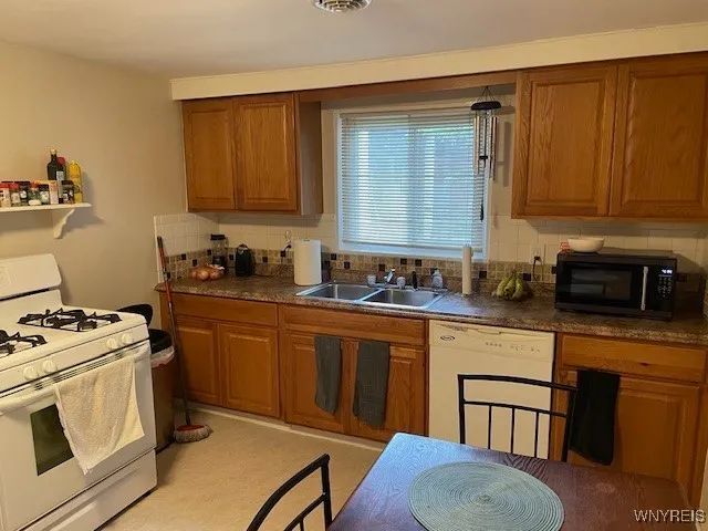 Kitchens are large enough to have a table with plenty of counter space, dishwasher, gas stove.