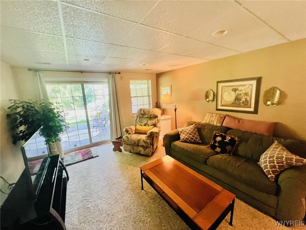 lower level family room with sliding doors to patio!