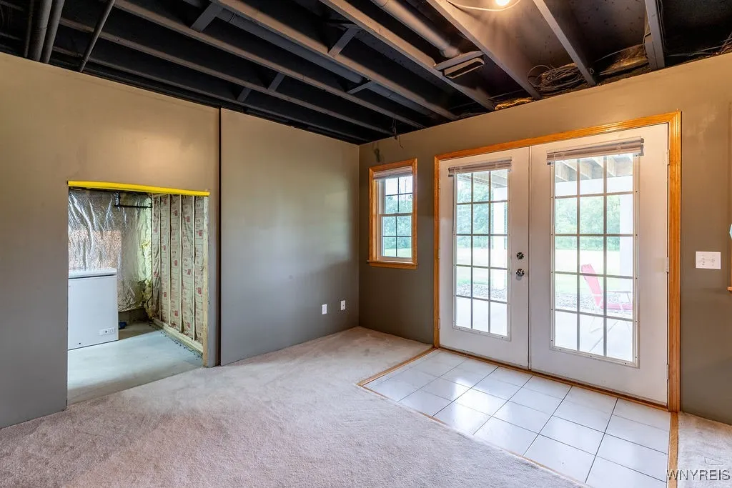 Family room area leading out to the lowest level deck.