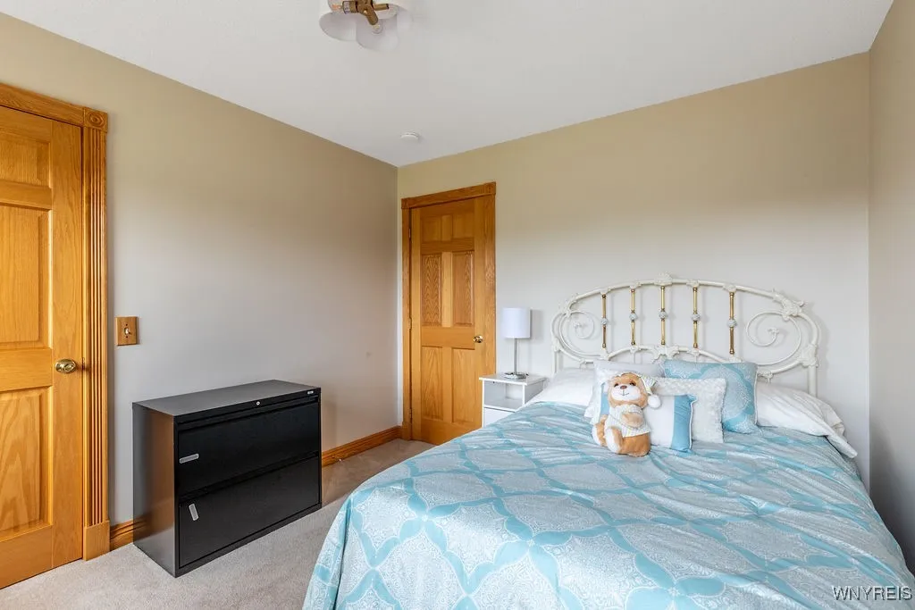 Front bedroom next to staircase and across from main bath…