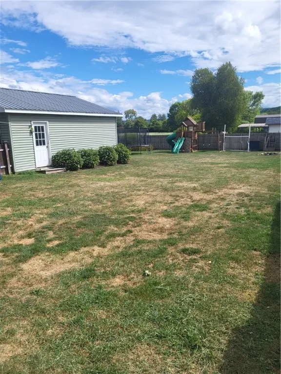 back yard with garage