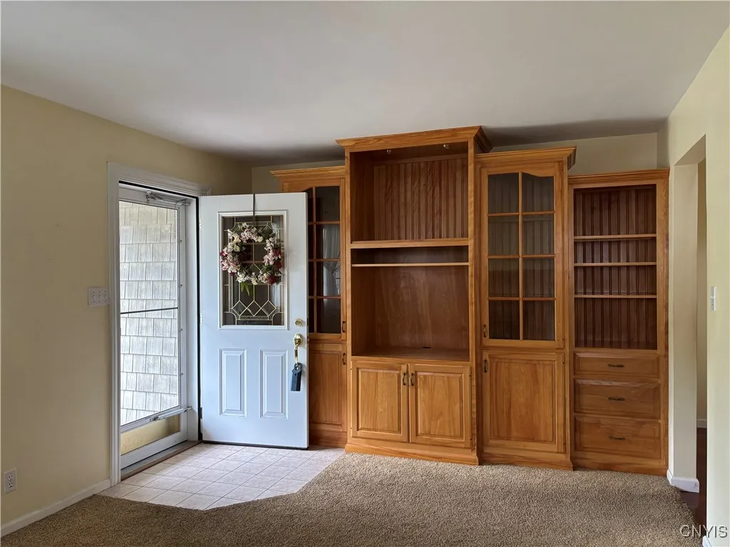 Living room with custom built cabinets