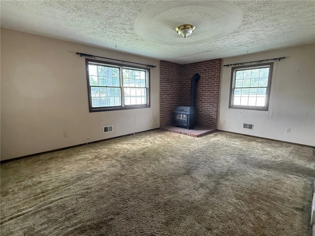 Lg. closet for possible bathroom, access to sunporch and egress