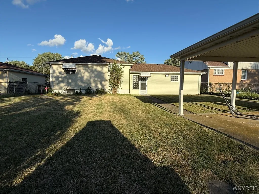 Backyard view of home