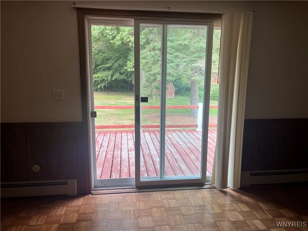Sliding door leading to the deck from the family room