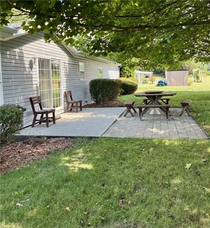 Patio is right off of the kitchen so outdoor dining and entertaining is a breeze!