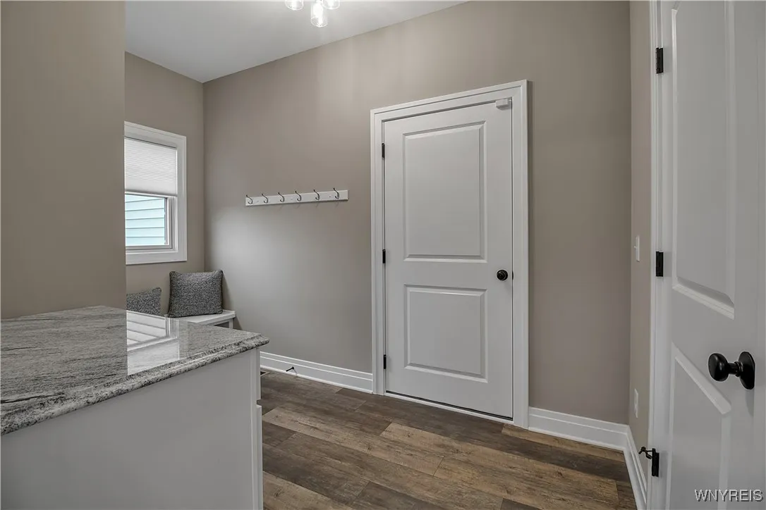 That is the garage entrance into the mud room / 1/2 bath area
