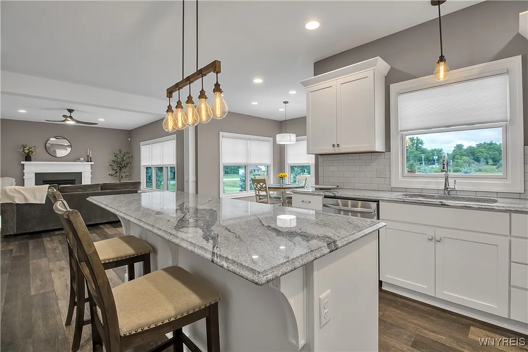 Nice view of kitchen, family room, and morning room (in background)