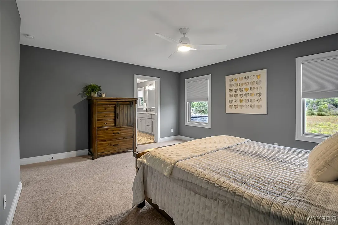 Primary bedroom lets lot of light in!