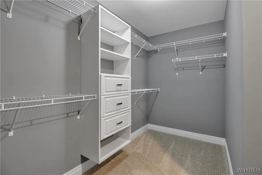 The walk-in closet in the primary BR offers a variety of storage options - really nice!