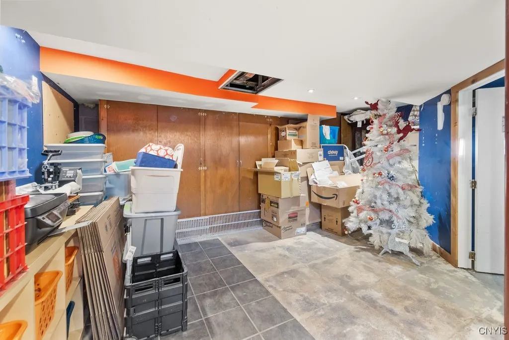 Currently an artist\'s studio with storage closets and shelves.