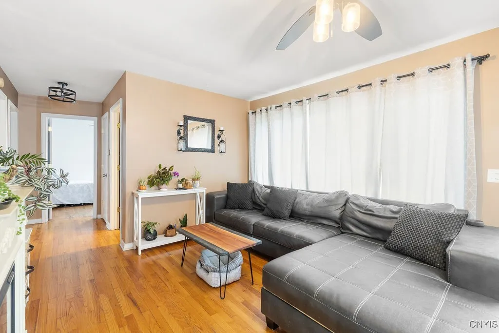 Hardwood floors lead to bedrooms, bathroom and linen closet.