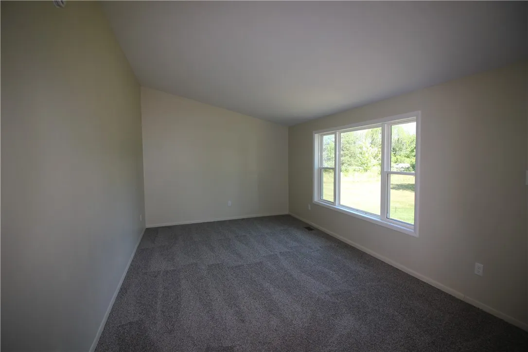 Living room with vaulted ceiling