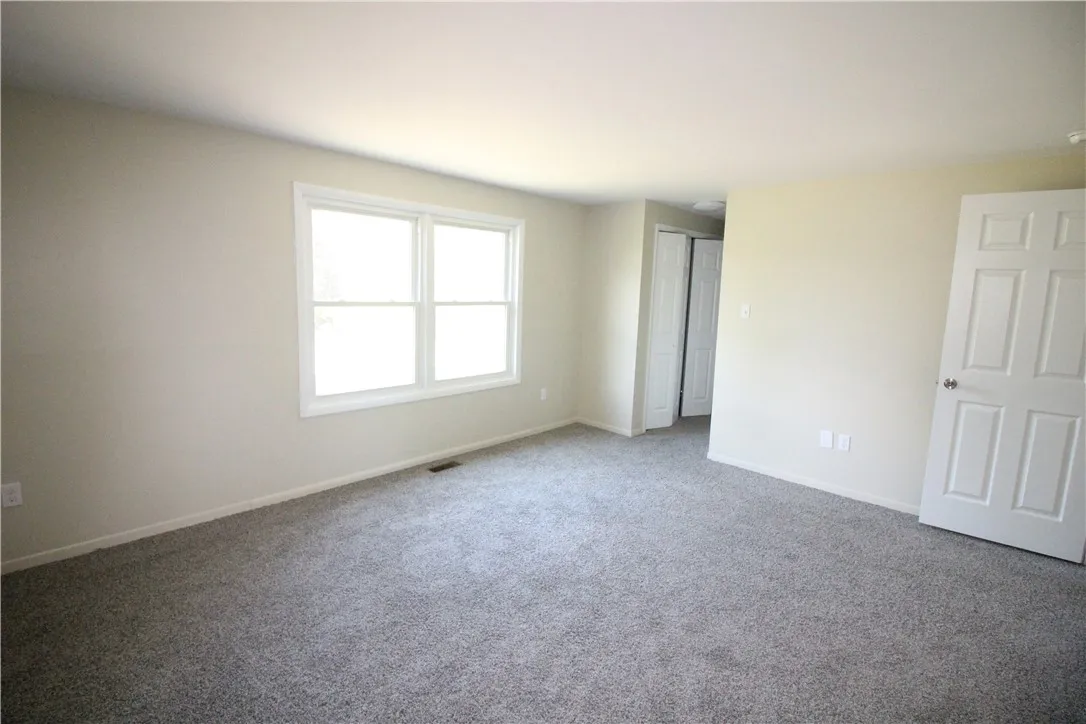 Main bedroom, new carpet, freshly painted, with private bathroom