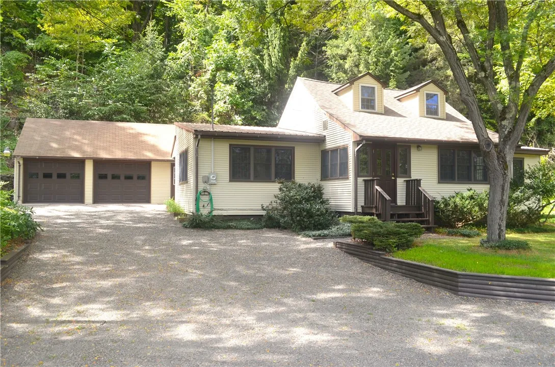 Home Has A 2 Car Detached Garage With Workshop