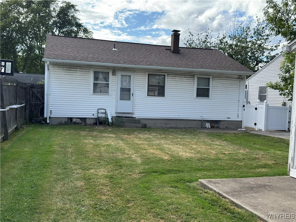 Rear View - Fully fenced yard. Roof 2019