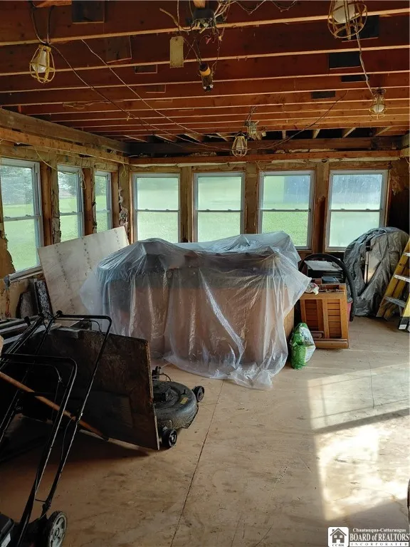 sun room with hot tub.