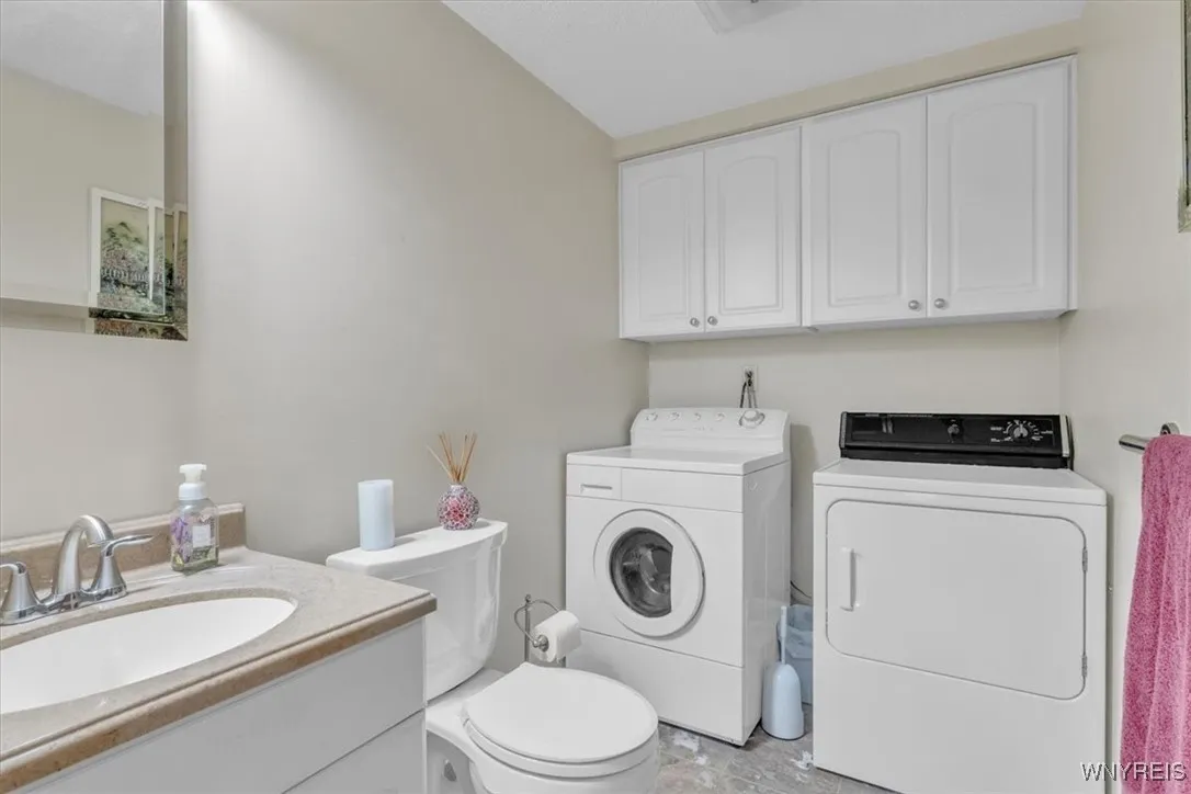 Bath and first for laundry off the kitchen