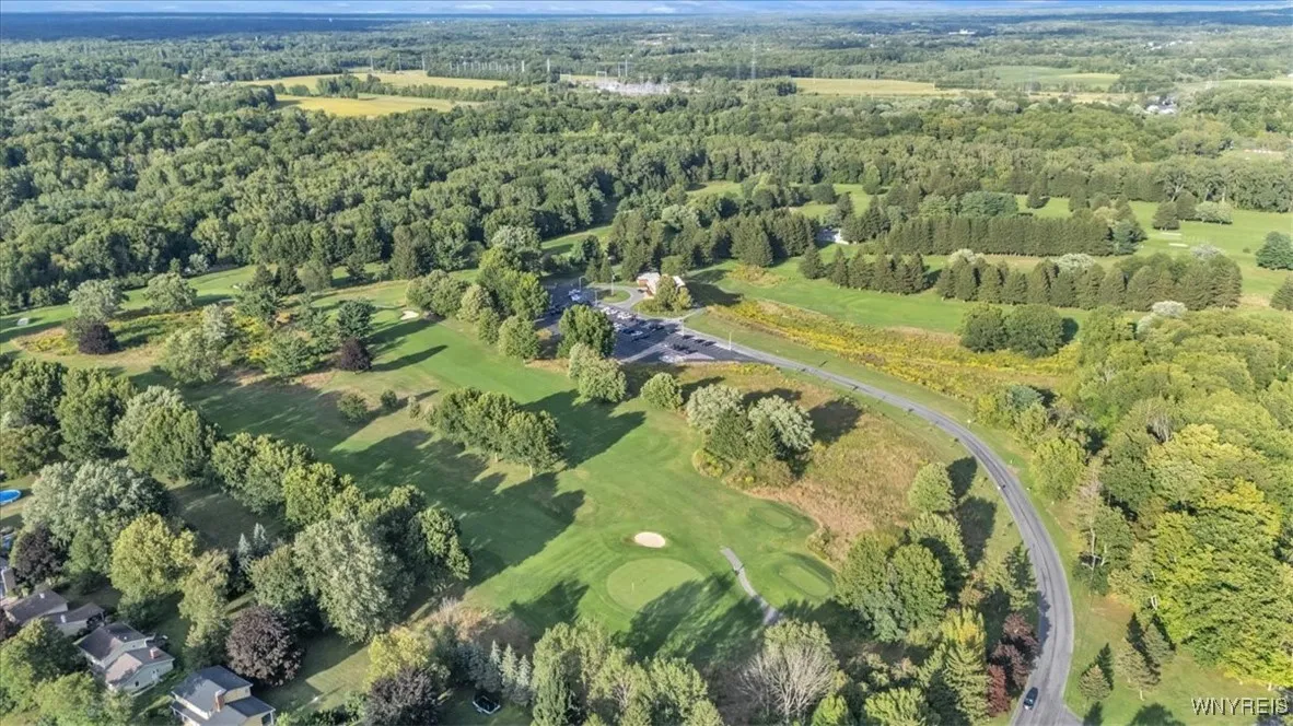 Elma Meadows Golfing right around the corner