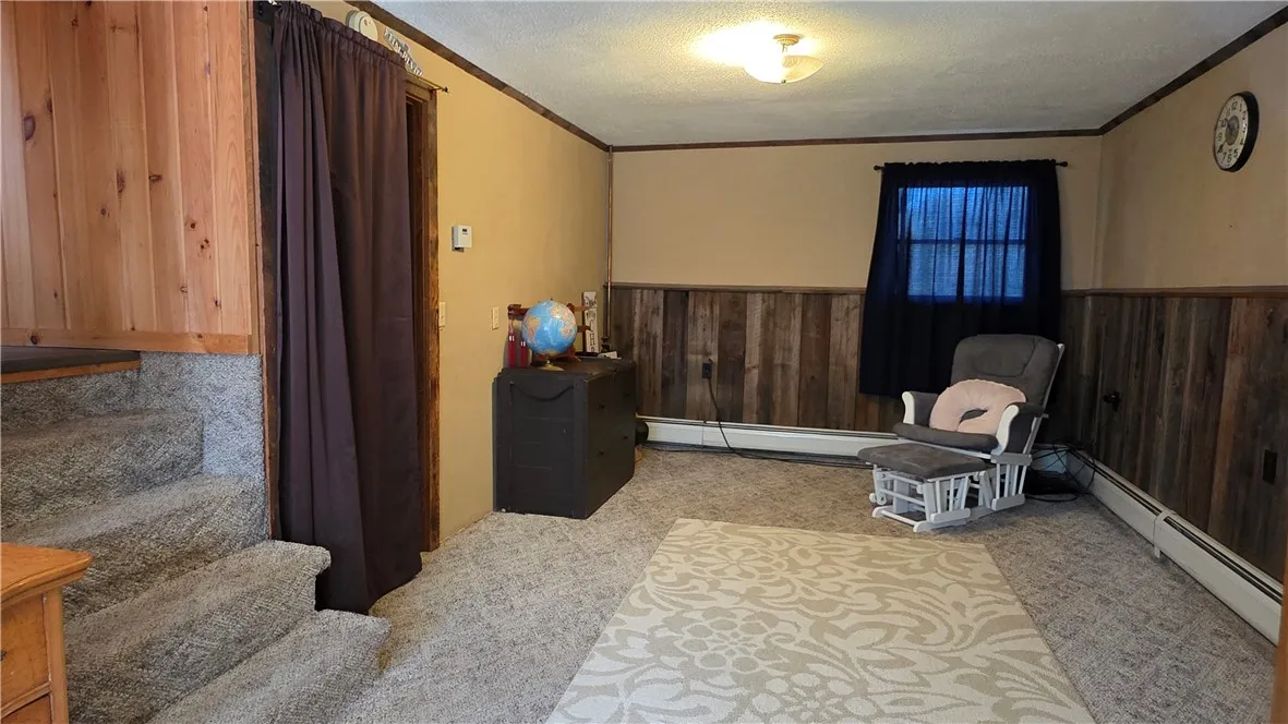 Lower level across from laundry and half bath