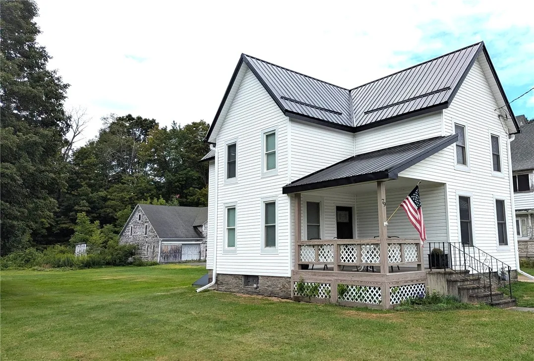 Side view showing more of new metal roof