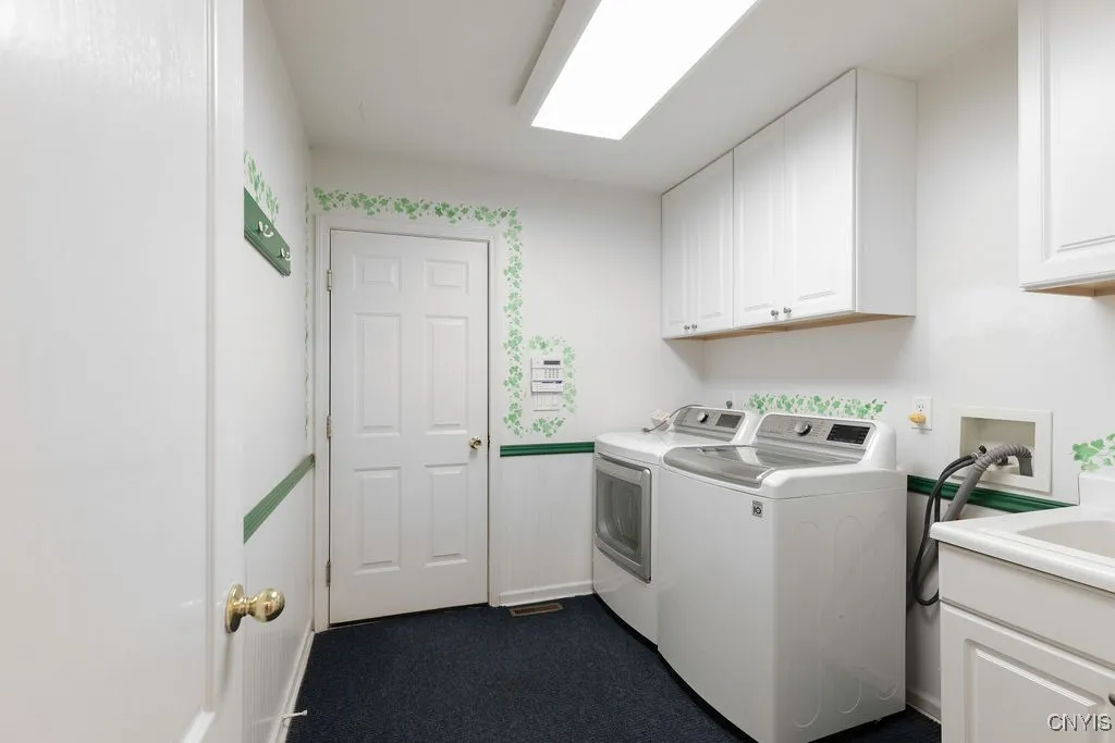 Convenient first floor  Laundry room/mudroom with sink!