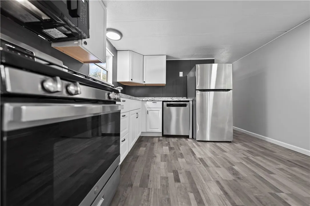 Kitchen with Luxury Vinyl Laminate flooring