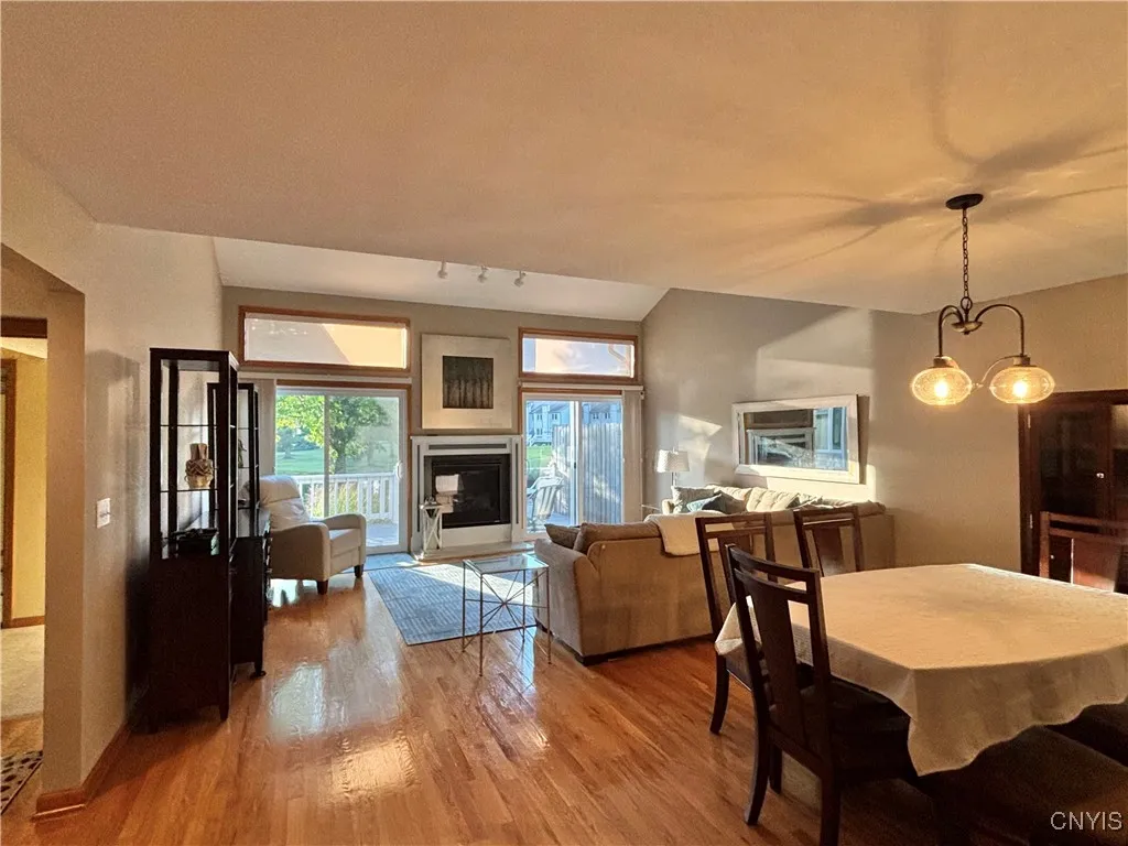 Living room/dining room.  Notice the hardwood floor.