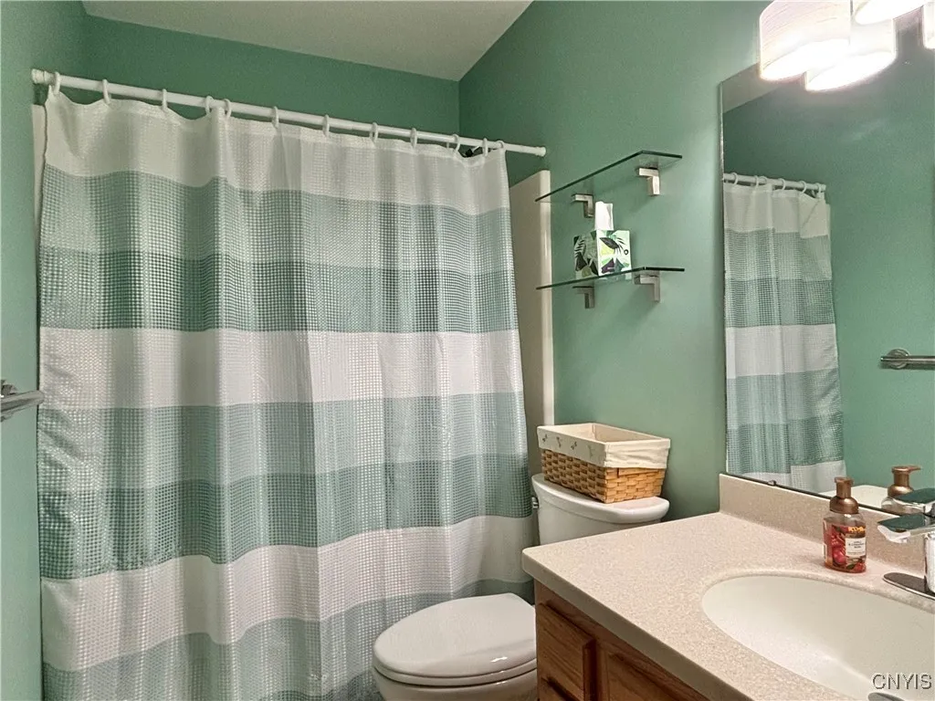 First floor full bath off the hallway.