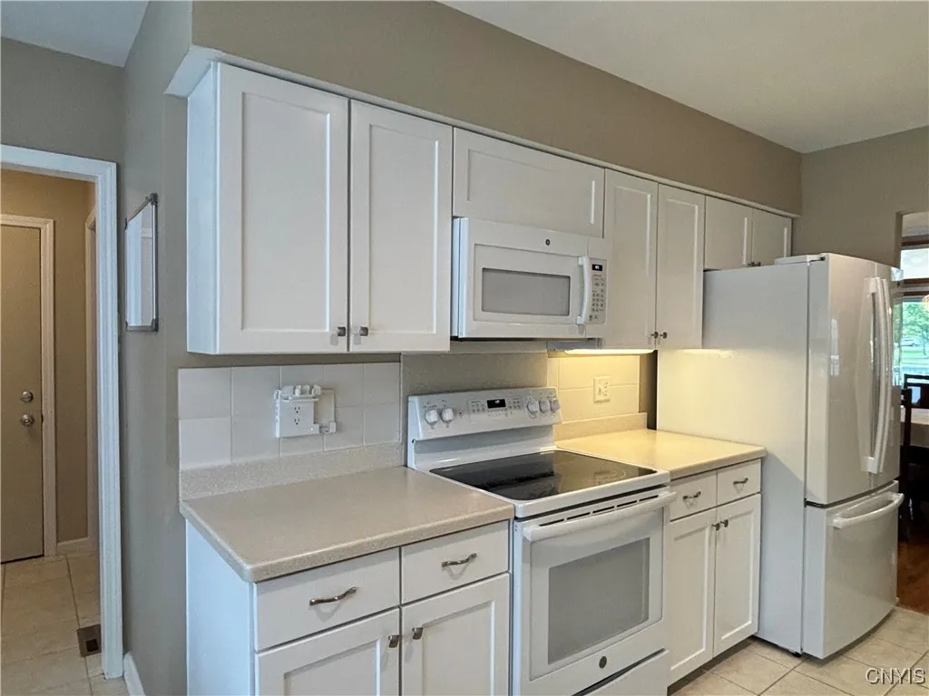 Kitchen.  Counter tops are Corian.