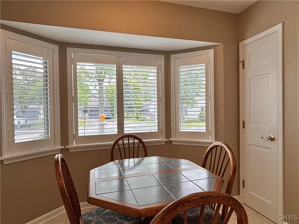 Breakfast area.  Notice the plantation shutters and pantry.
