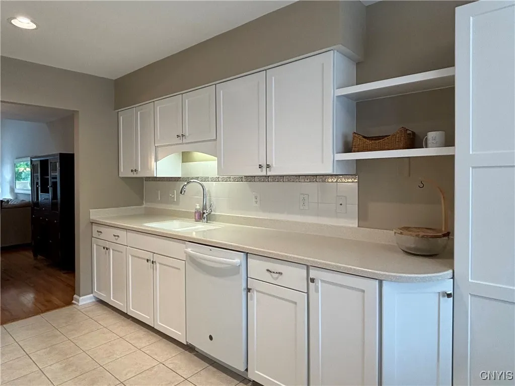 Kitchen.  Notice the ceramic tile floor.