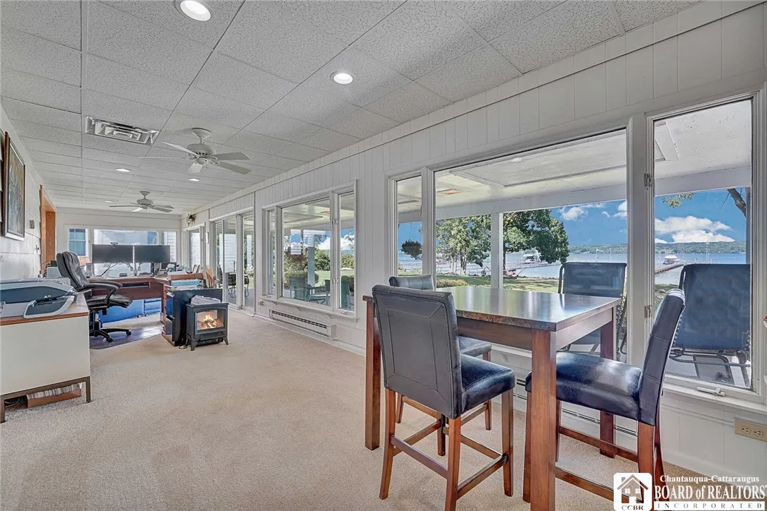 Compete in a game of checkers while watching the sail boats go by\n